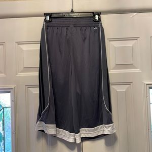 Adidas men’s shorts. Size small. Dark gray with three black stripes on the side.